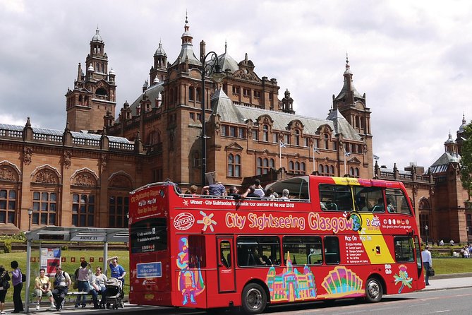 City Sightseeing Glasgow Hop-On Hop-Off Bus Tour - Onboard Experience: Headphones, Sitting Up Top, and Hearing the Guide