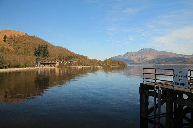 Loch Lomond National Park & Stirling Castle Full Day Tour - Luss: cottages, flowers, and a Viking grave you’ll remember